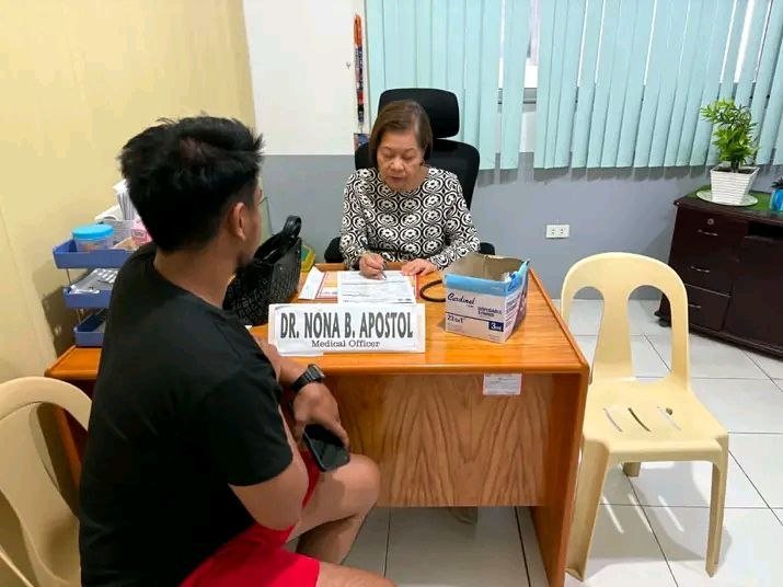 Doctor attending to a patient