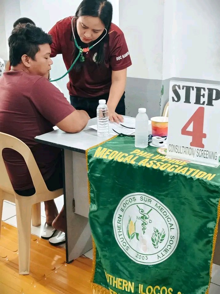 Doctor attending to a patient